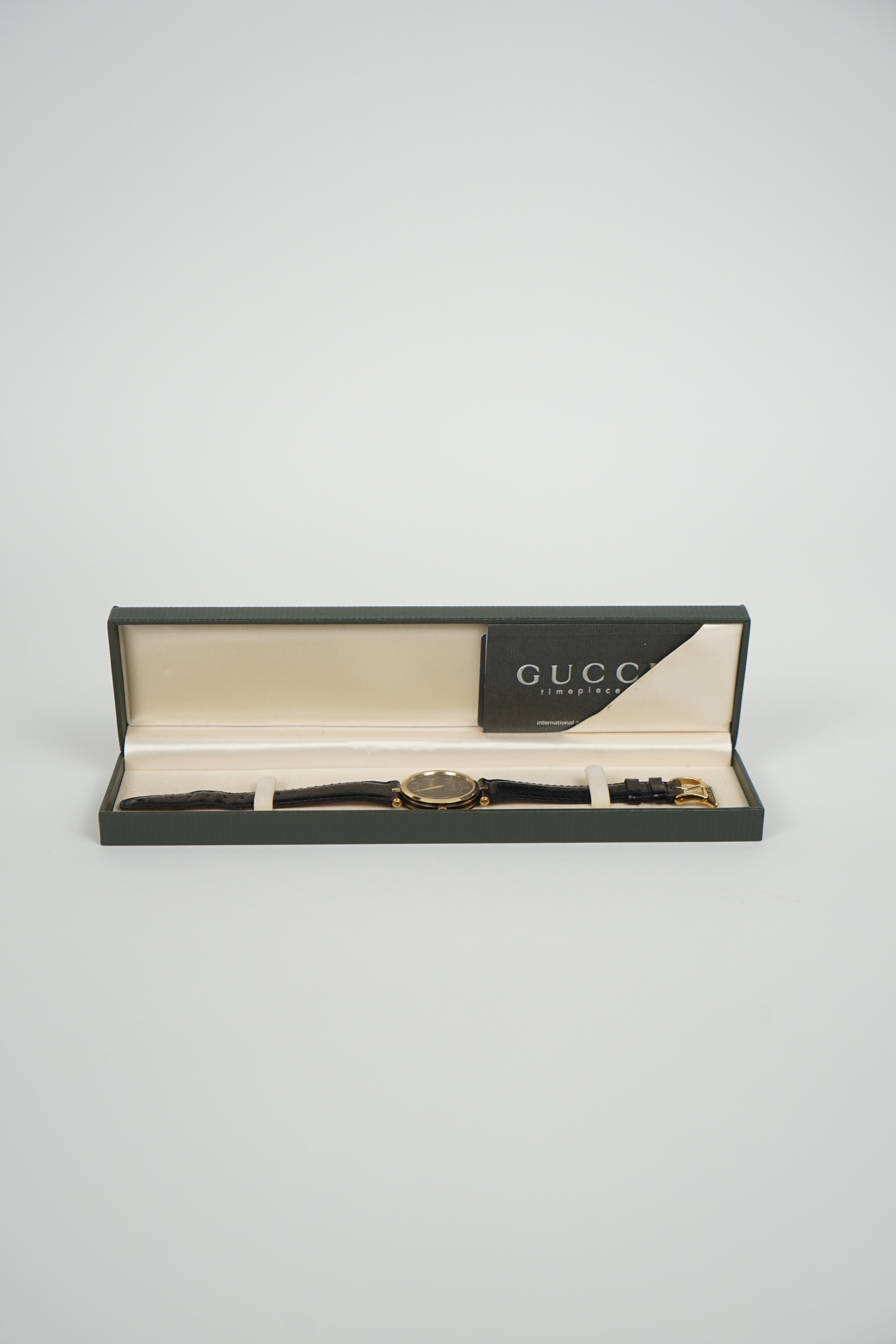 Vintage Gucci Black Leather Gold Watch