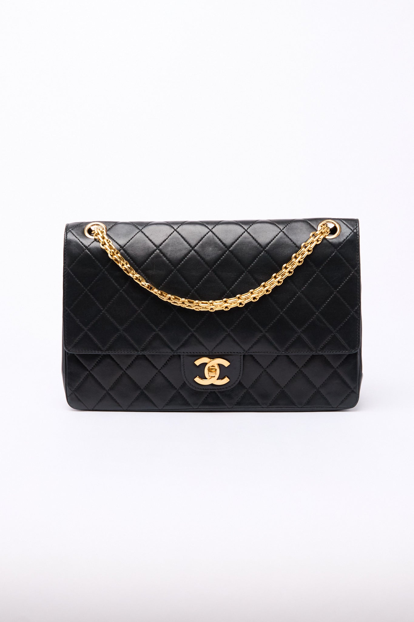 Chanel Black Lambskin 24k Gold Flap Bag