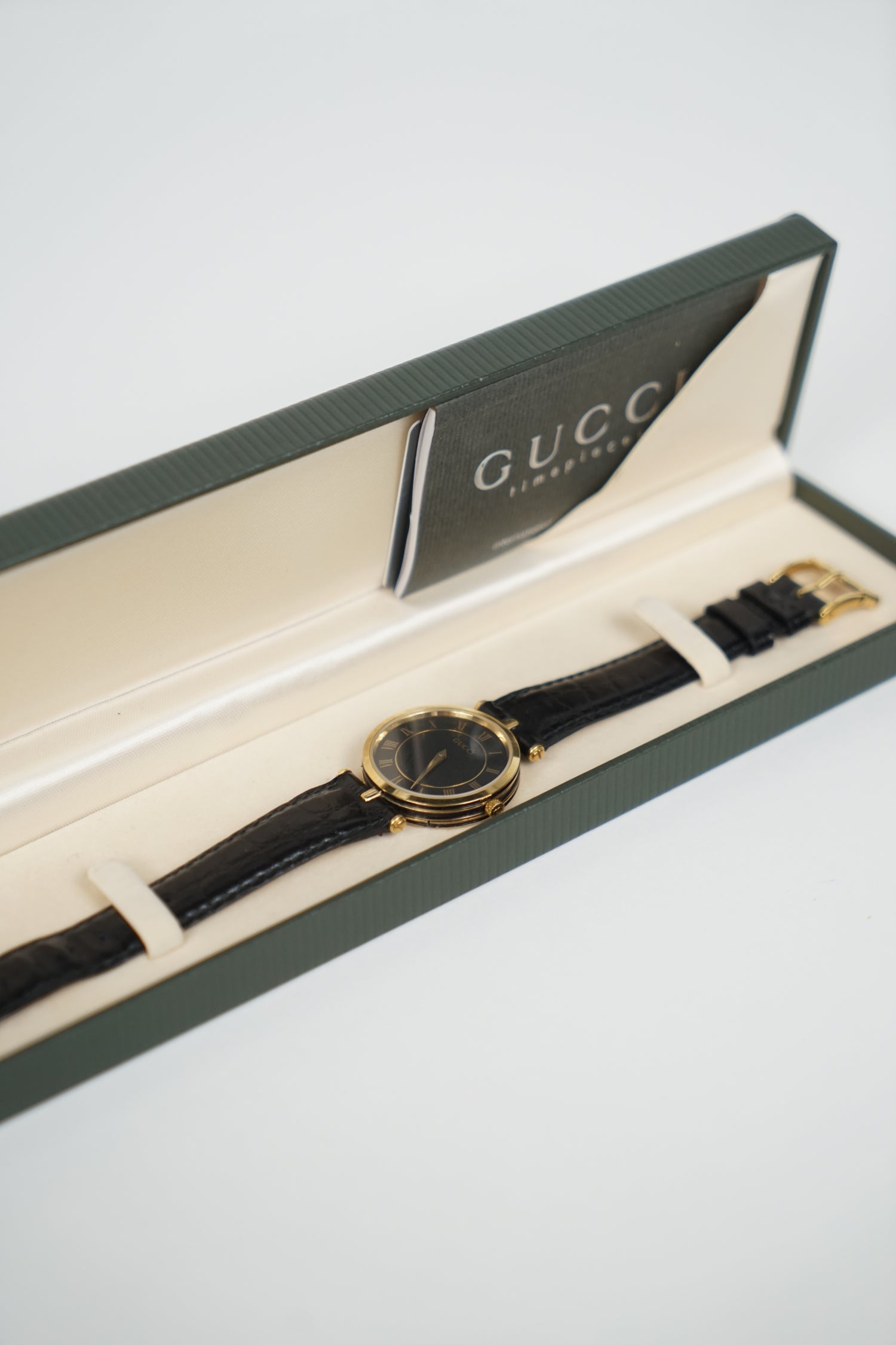 Vintage Gucci Black Leather Gold Watch