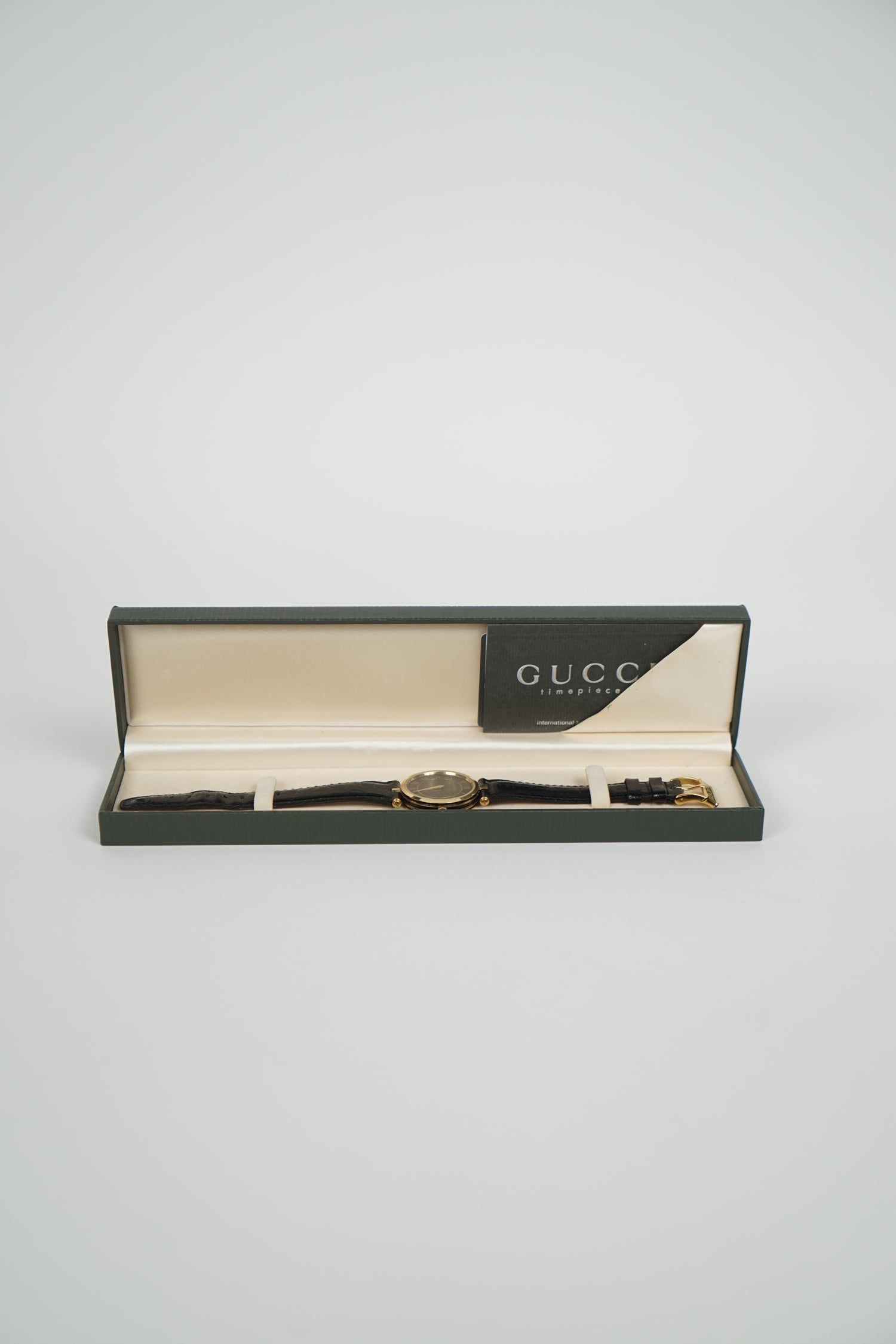 Vintage Gucci Black Leather Gold Watch