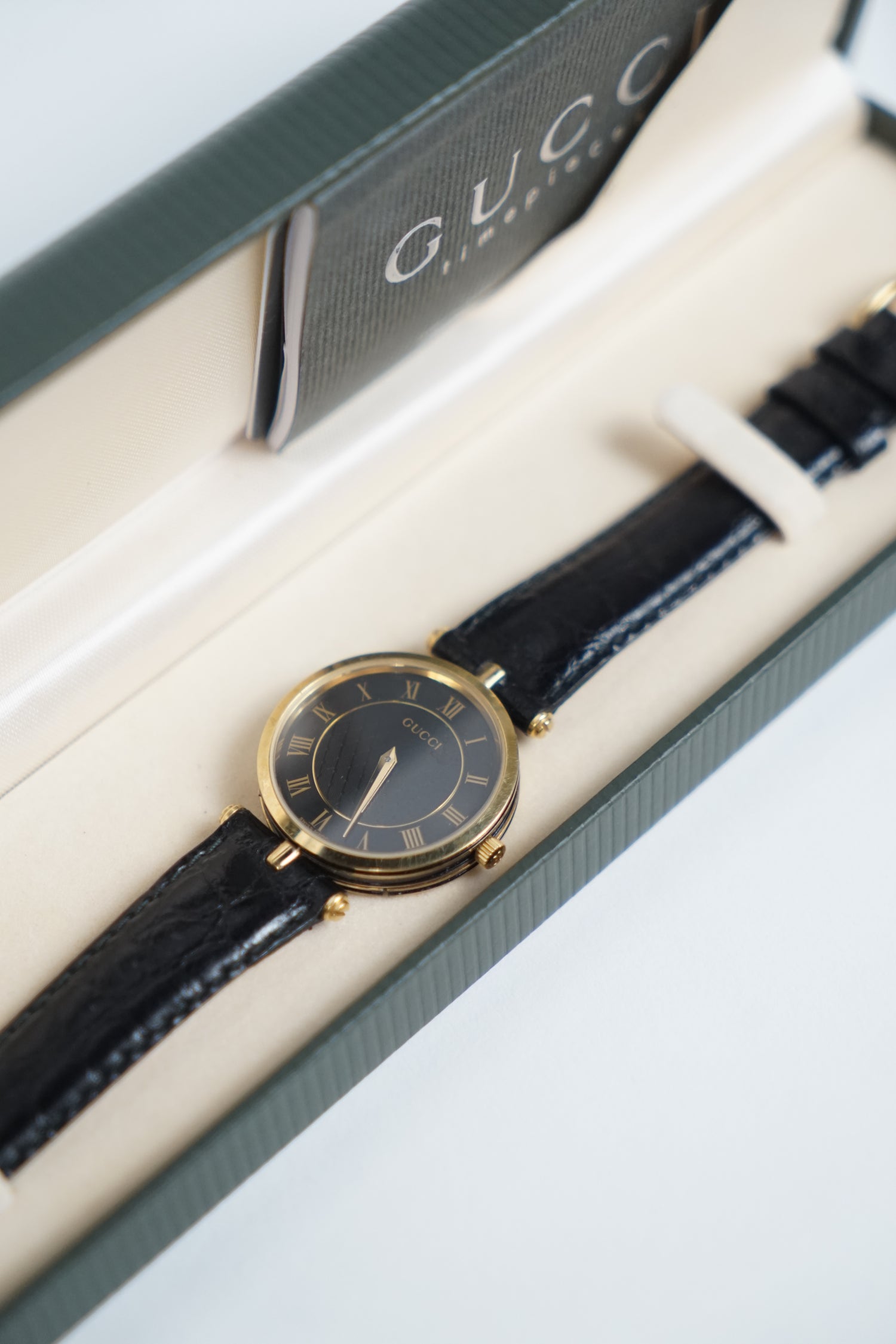 Vintage Gucci Black Leather Gold Watch